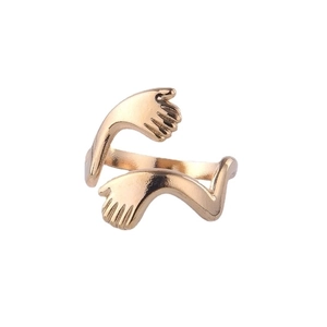 Unique rose gold embrace hands hugging ring made of polished stainless steel for women