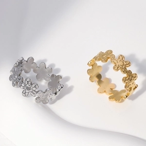Minimalist daisy flower open ring set in gold and silver plating on white background