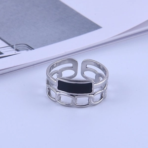 Retro hollow stainless steel ring with black enamel accent and adjustable open band