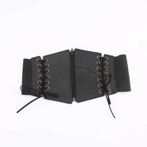 Gothic retro wide black waist belt with front zipper and lace-up details on white background