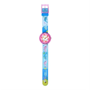 Close-up of children's ocean watch showing pink dolphins and colorful dial numbers