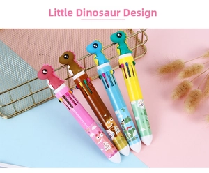 Detailed view of four dinosaur themed multi-color pens in a creative stationery setting