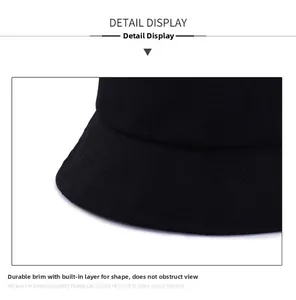 Detail view of solid black cotton bucket hat brim with durable structured stitching