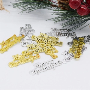 Gold and silver Merry Christmas letter pendants for tree decoration on white background