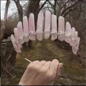Close-up of handmade pink crystal crown with wire wrapping for weddings and festivals