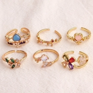 Elegant gold flower rings with colorful zircon and heart-shaped crystals for women