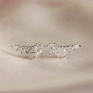 Elegant s925 silver wing earrings with marquise-cut white zircons in a radial design