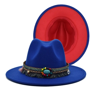 Detail of blue wool fedora with bohemian beadwork, turquoise stone, and red interior lining