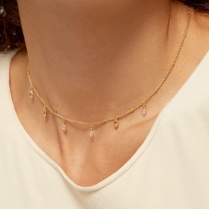 Elegant gold S925 silver necklace with pink marquise-cut zircon pendants on neck