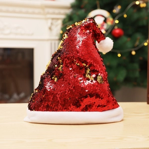 Christmas hat with red sequins, white plush trim, and antlers in a festive setting