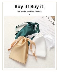 Detail of satin drawstring pouches in dark green, white and champagne gold with silk texture