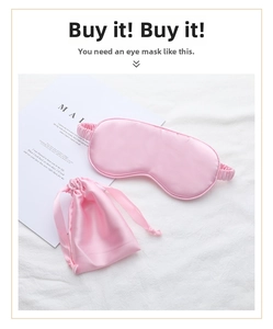 Pink faux silk sleep eye mask and matching storage pouch set on white fabric