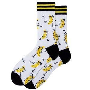 Detail of white cotton crew socks with yellow stripes and knitted banana patterns