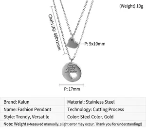 Macro detail of double-layer stainless steel necklace with engraved heart pendants