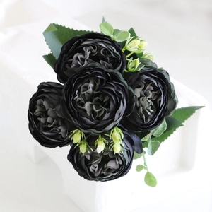 Close-up of gothic black silk peony bouquet with five flower heads for home wedding deco