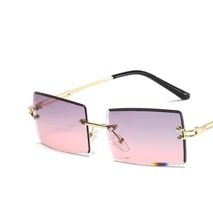 Frameless square sunglasses for women with pink-purple gradient lenses and gold metal temples