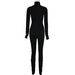 Back view of a black high-neck long-sleeve bodysuit with stretchy ruched sleeve details