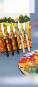 Detailed set of 5 stainless steel palette knives with wooden handles for oil painting
