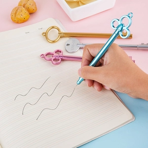 Creative key-shaped gel ink pens in four metallic colors for student writing stationery