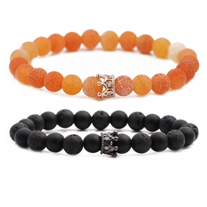 Close-up of 8mm lava stone and turquoise bead bracelets with micro-pave crown charms