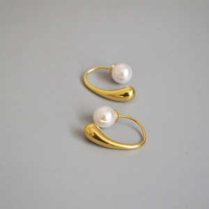 Elegant gold brass C-shape drop earrings with pearls in a minimalist French style