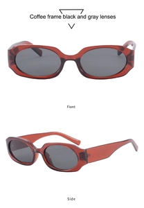 Detailed macro view of retro coffee frame sunglasses with sleek dark grey lenses