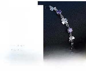 Detail of S925 sterling silver clover bracelet with 4.75mm purple zircon and adjustable chain