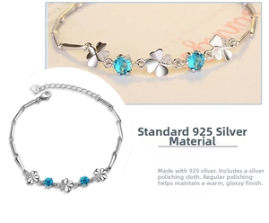 Close-up of S925 sterling silver four-leaf clover bracelet with blue zircon accents