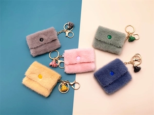 Mini plush coin purse keychain set with metal ring and colorful tassels in five vibrant colors