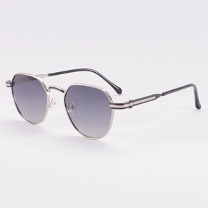 Vintage geometric metal sunglasses with hexagonal frames and gradient lenses for travel