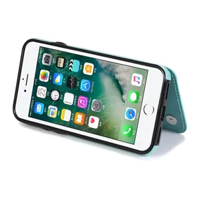 Close-up of mint green mandala embossed leather phone case with stand and magnetic closure