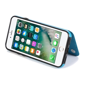 Blue mandala embossed leather flip case for iPhone showing kickstand function and magnetic closure