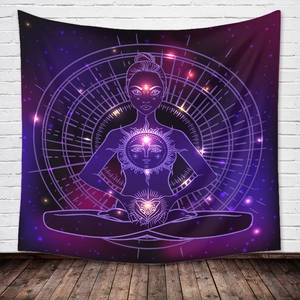 Bohemian meditation tapestry with cosmic solar figure on a rustic white brick wall