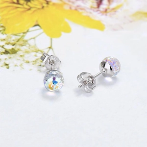 Detailed view of Aurora crystal ball studs with S925 sterling silver hallmark engraving