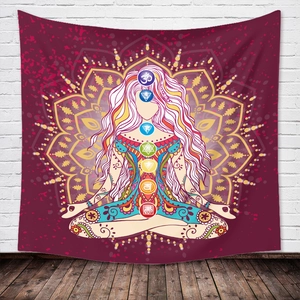 Detail of meditation tapestry showing seven chakras and golden mandala on purple fabric