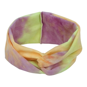 Close-up of bohemian tie-dye headband with purple and orange gradient twist detail