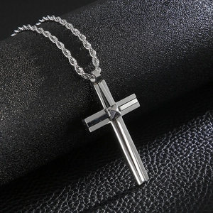 Hip hop silver stainless steel double cross pendant with twist chain on black background