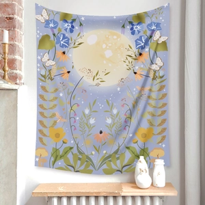 Detail of floral and moon phase tapestry featuring butterflies and botanical patterns