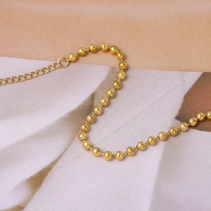 Minimalist gold ball chain bracelet in stainless steel with adjustable extender link