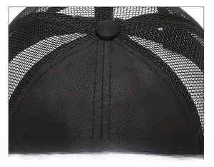 Close-up of durable six-panel stitching on top of black mesh breathable baseball cap