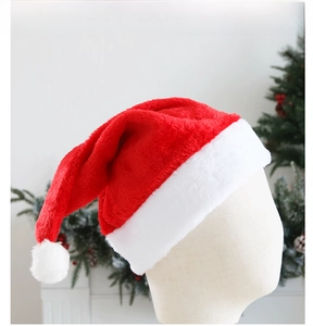 Classic plush red and white Christmas hat displayed on mannequin head model