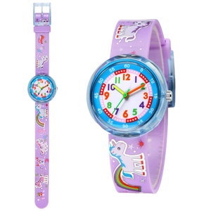 Close-up of children's purple silicone watch band with colorful unicorn and rainbow prints