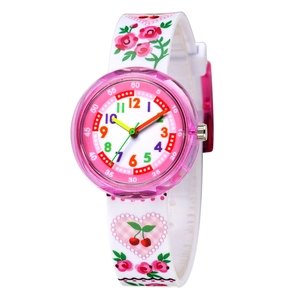 Detail of pink floral and cherry patterns on white silicone strap of kids watch
