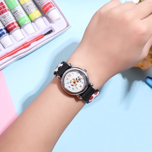 Detailed close-up of 3D football pattern on a kid's watch strap with colorful numbers
