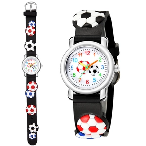Detail of 3D embossed soccer pattern on black silicone strap of kids sports watch