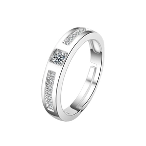 Macro detail of silver adjustable ring featuring princess cut zircon and pave stones