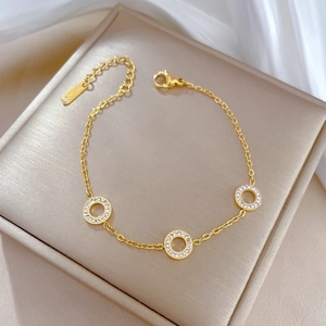 Titanium steel gold chain bracelet with three sparkling round rhinestone charms