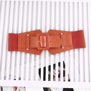 Orange elastic wide corset belt with leather front panel and square buckle decoration