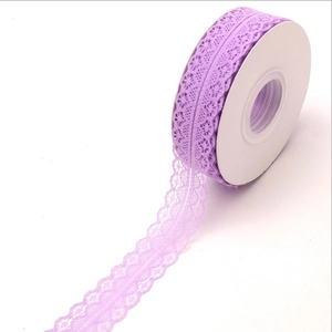 Purple lace mesh ribbon roll with hollow flower pattern for flower bouquet packaging