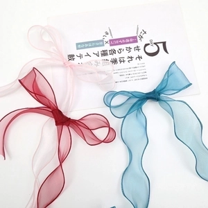 Three-color organza fish-tail ribbon bow set in pink, burgundy, and peacock blue colors